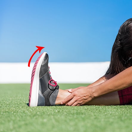 running shoe with a toe spring