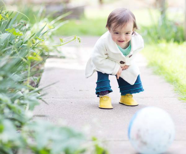 Get the Rambler for the Perfect Indoor/Outdoor Soft Shoe! Child Plays with Ball in Yellow Leather Shoes