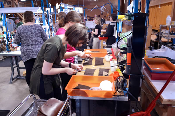 shoemaking-class-gluing-shoes Class Members Make Their Own Shoes