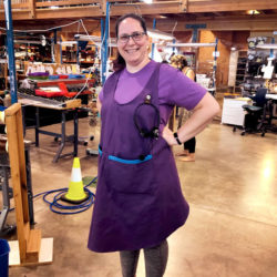 Elf Crystal made sure her apron had a pocket for the Customer Service phone, and a magnetic holder for her headpiece.